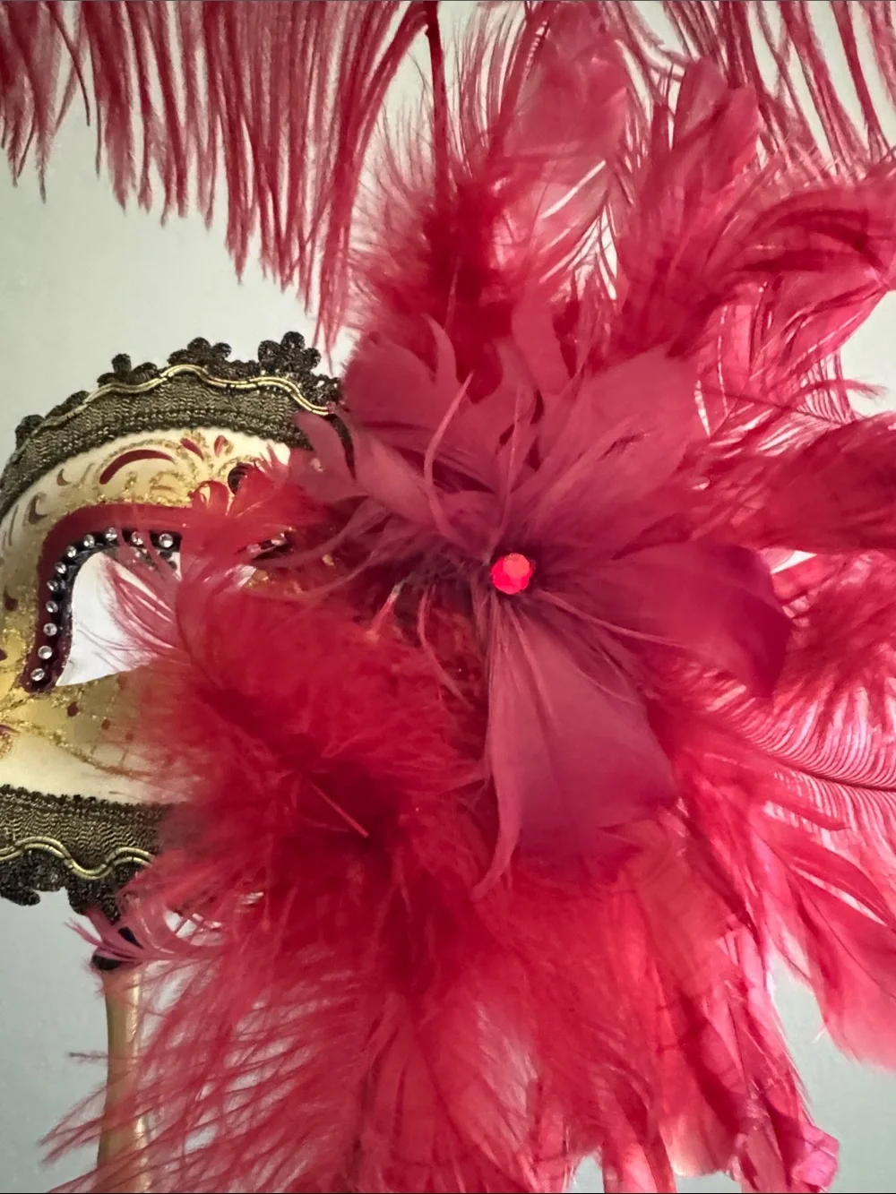 Gold Venetian Handheld Mask with Red Feather Accent